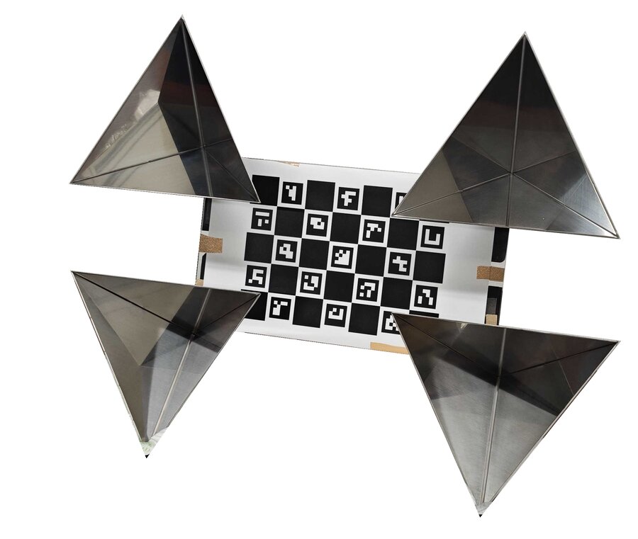 Calibration board used for ground truth: a ChArUco pattern surrounded by four metal corner reflectors.